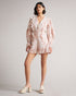 IRVETE-Trousers-Ideal for sunny walks along the river or enjoying a pub lunch, IRVETE is as easy to throw on as it is captivating. Finished with ruffles, this romper is a must-have for your summer wardrobe. Ted Baker womenswear collection Romper Soft ruffle detail Fully lined Our model is 5'9" / 1.75m and wears a Ted size 1- Ted Baker Romania